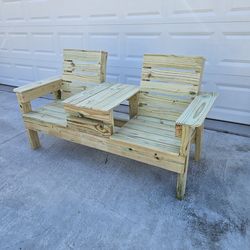 Wooden chair with built-in table