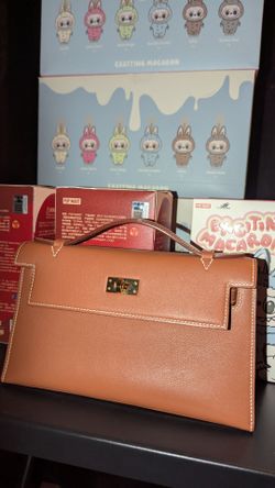 Hermes Pochette Kelly MINI Clutch swift