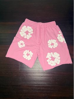Pink Denim tear shorts