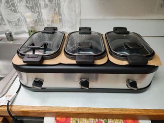 Never used. Brown on top is still cardboard packaging. Only taken out of box for pics. Can control each pot individually.