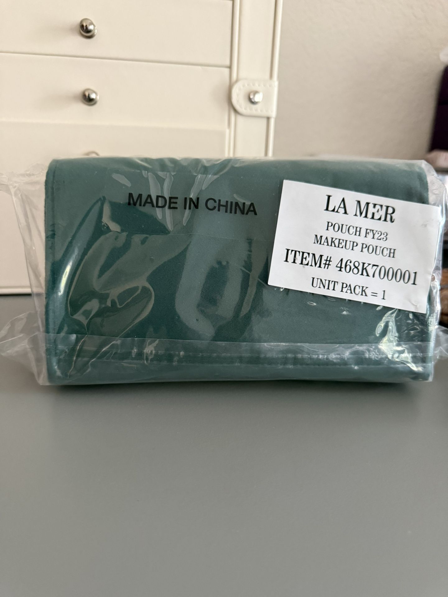 La Mer green velvet makeup pouch