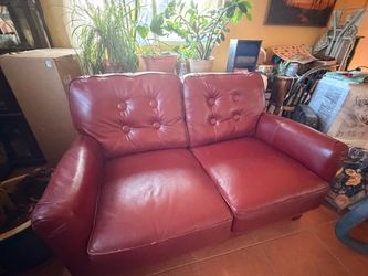 Red leather loveseat