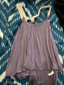 Woman’s small purple shirt