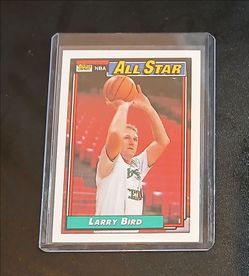 Larry Bird 1992 All-Stars card in a hard protective case.  $5