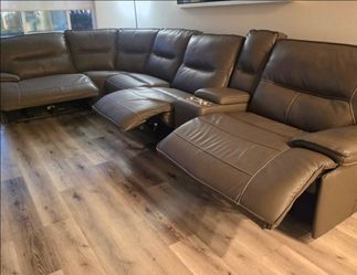 Leather power reclining sectional sofa