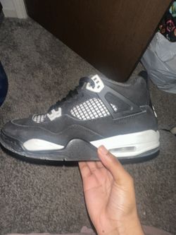 white and black jordan 4s