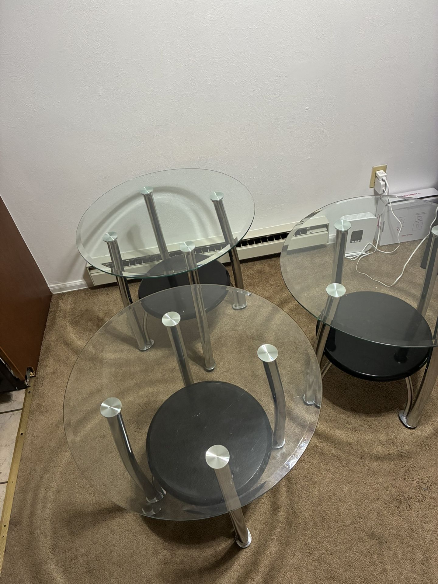 Set of Tables — 3 Round, , and 1 Oval Glass