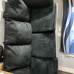 1 Year Old 2 Piece Black Couch 