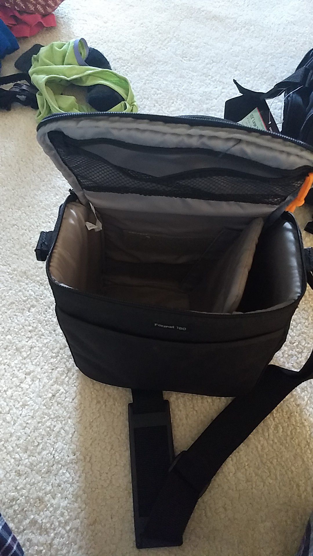 Lowepro camera bag (model: Format 160). Not very large, but call hold an SLR & 1 lens.