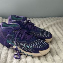 Used Donovan Mitchell purple 4s