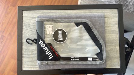 Surf board traction pad