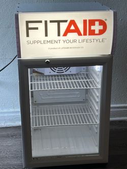 The LIFEAID FitAID Mini Fridge (Model BSF40L) is a 40-liter countertop beverage display cooler