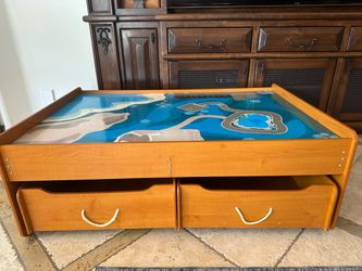 Wooden train table with storage