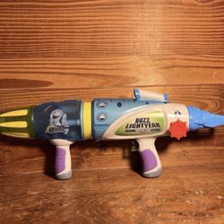 Disney Store Pixar Toy Story Buzz Lightyear Toy Glow In the Dark Blaster Gun