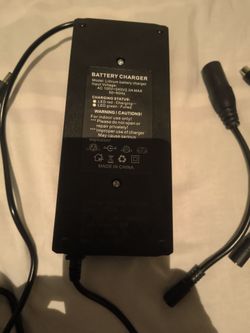 Universal battery charger w/all attachments