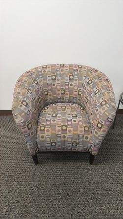 Three upholstered chairs and Coffee Table
