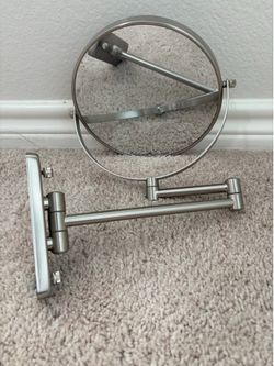 Mirror - Double-sided (1 side magnified), adjustable and wall mountable