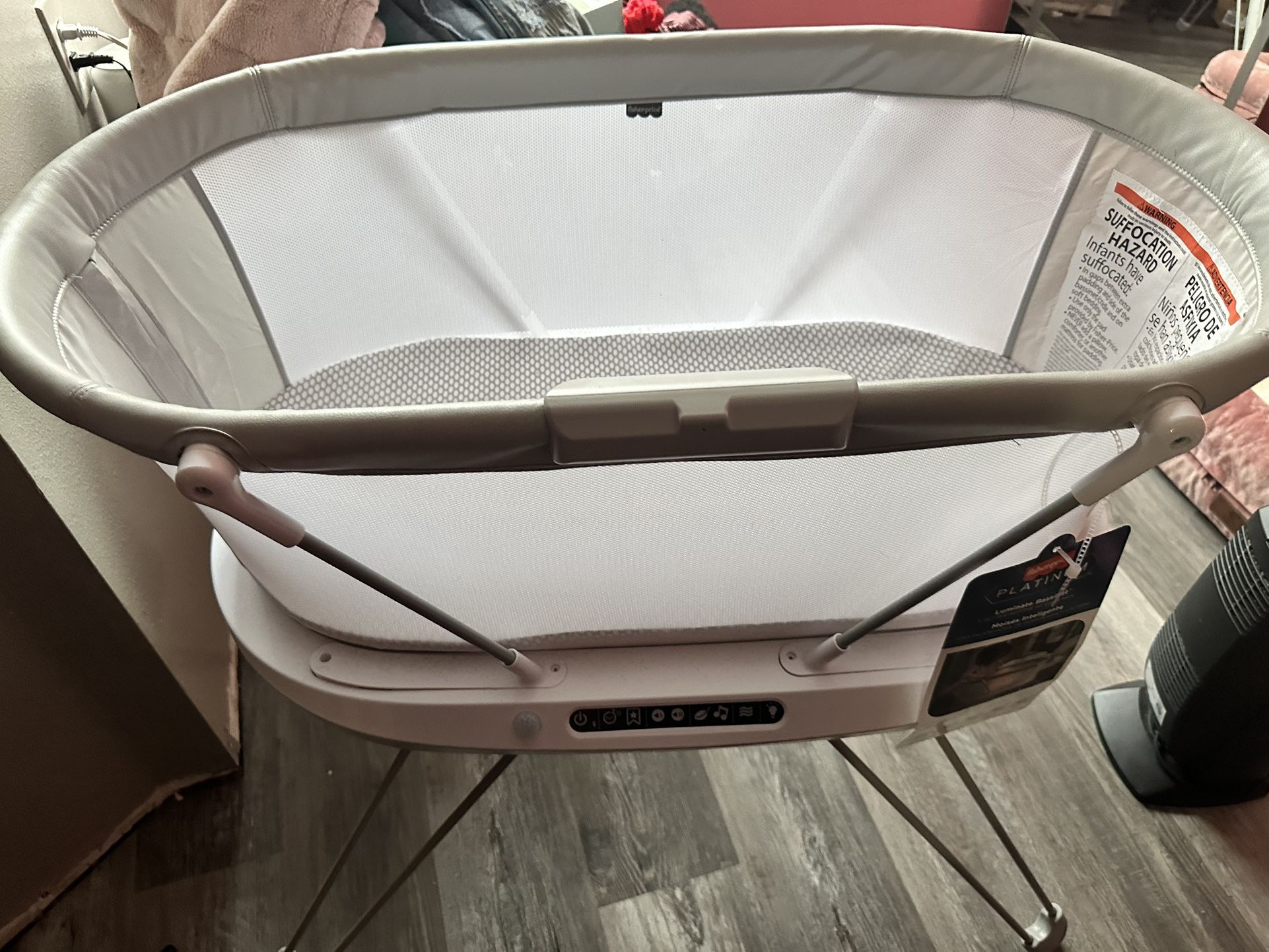 fisher price luminate bassinet with bluetooth functions