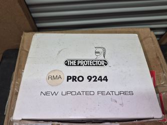 new in box -car alarm w/remotes