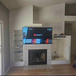 LG 65" TV with wall mount