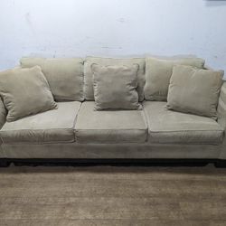 Tan Fabric Couch With Wood Trim & Throw Pillows