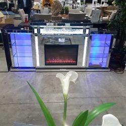 Stunning Fireplace With LED Lighting Side Shelves Bluetooth Speakers Touch Display And Remote Control Firm Price $1,900 Financing Available 