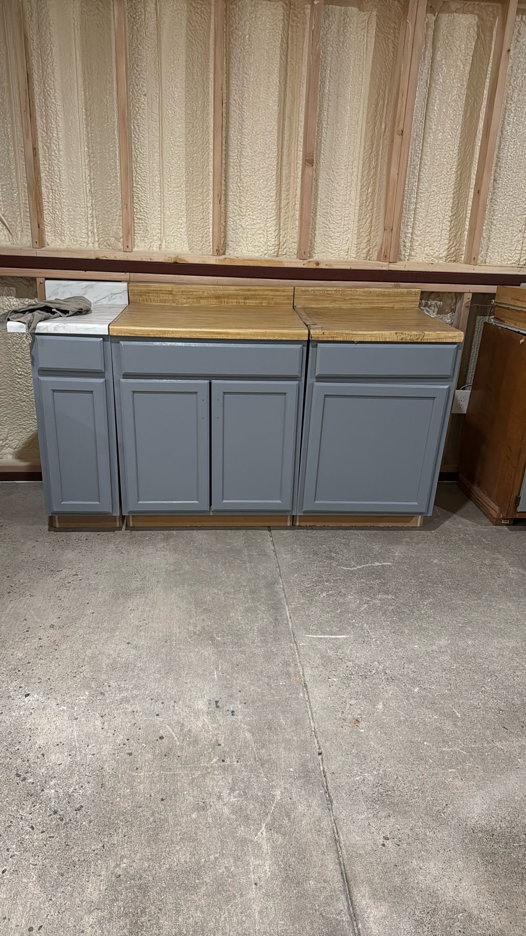 KITCHEN OR LAUNDRY CABINETS