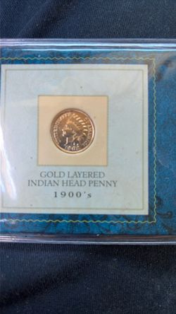 Un centavo de 1902 con chaps de oro.