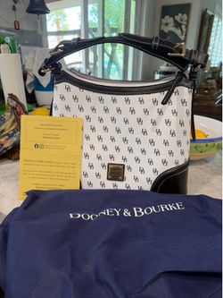 DOONEY AND BOURKE PURSE/NEW