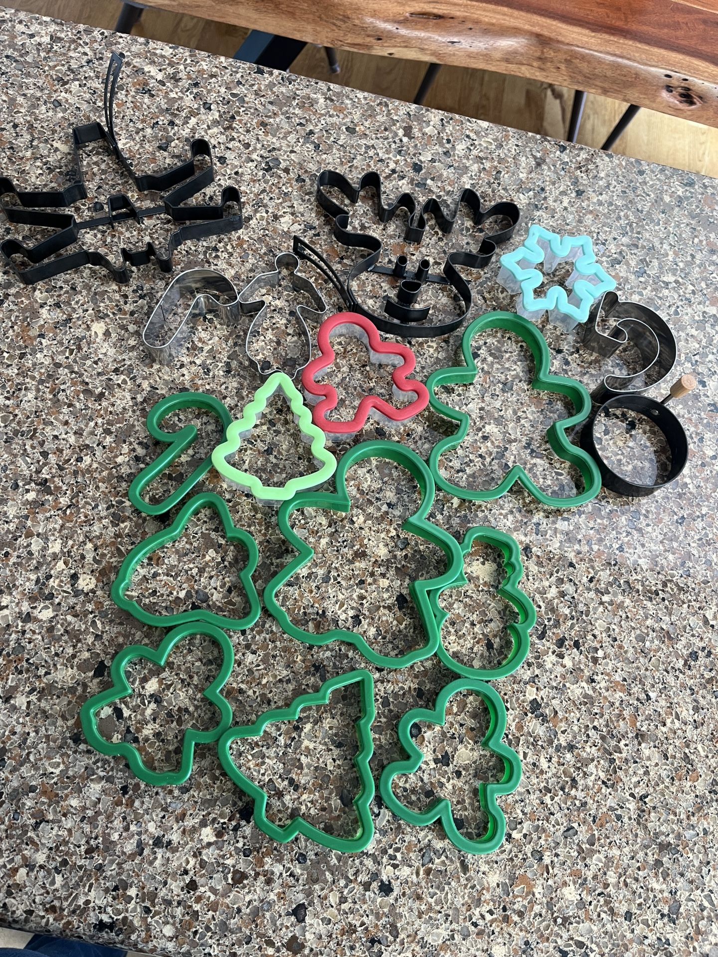 Assortment of cookie cutters Star Wars ship Reindeer Candy cane Christmas tree Gingerbread man Gingerbread woman Snowflake and more