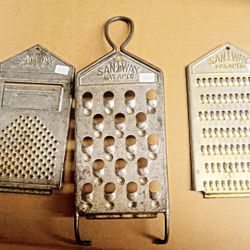 Three  San-I-Way Handheld Shredders 