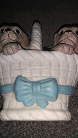 Two puppies in a basket