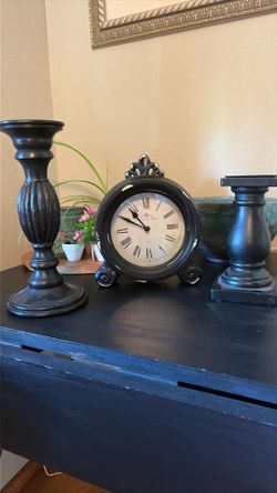 Vintage candle stands and clock