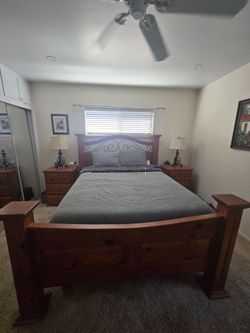Matching Solid Wood Bedroom Set – Queen Bedframe, Dresser, Nightstands & LampsWarm reddish‑brown/amber stain with a smooth sheen.