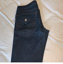 Seven pairs True religion Jeans size 34 (all jeans for sale) some fairly used worn once and others new.  7 pairs