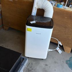 Honeywell Portable Air Conditioner that Vents Through A Window.