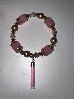 Pink and Gold Beaded Bracelet with Vial Charm