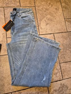 RISEN JEANS . Size 11