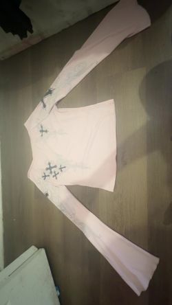 Off the shoulder flared arm, pink cross shirt from SHEIN