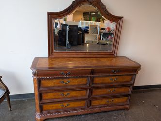 Ornate Dark Wood Dresser with Arched Mirror