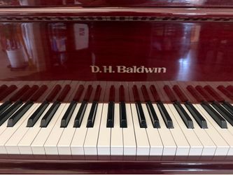 D.H Baldwin baby grand piano.
