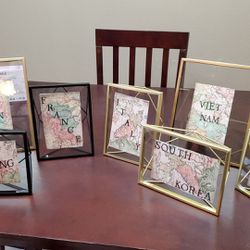 Travel Themed Wedding table assignments - one for each country we traveled to prior to the wedding