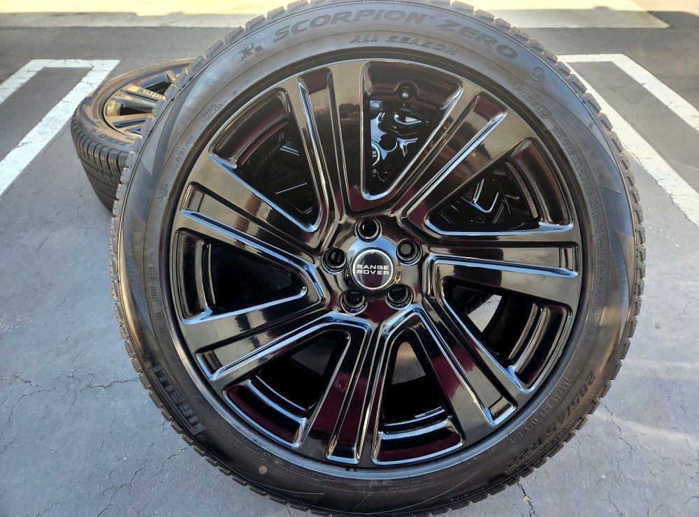 22" Range Rover 2023 Gloss Black OEM wheels and tires
