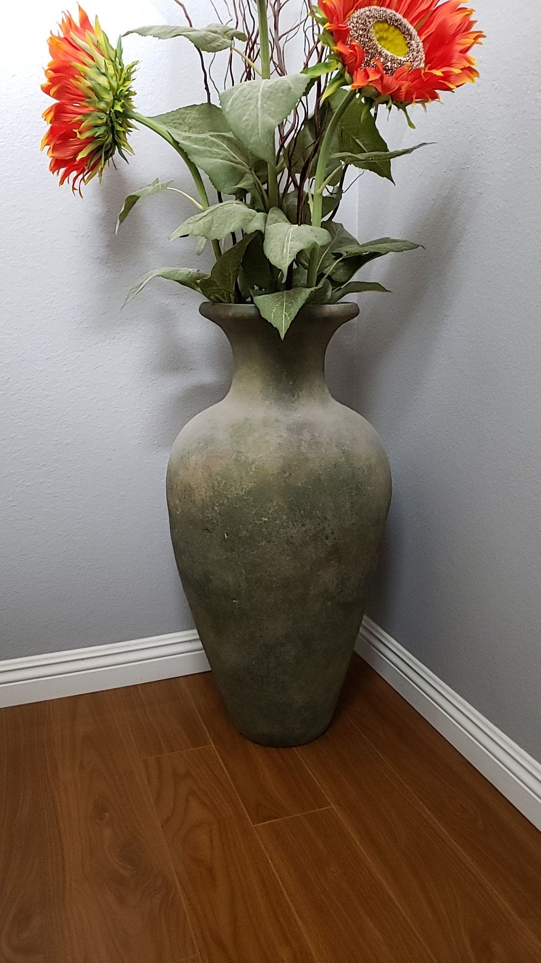 Vase with artificial flowers included