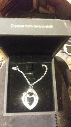 Swarvoski crystal pendant. "A mother holds her childs heart forever." Necklace