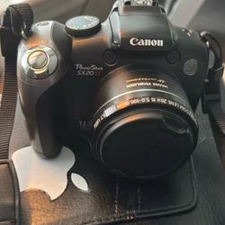 Canon PowerShot SX20 IS 12.1MP Digital Camera with 2.8-Inch LCD (Black) 20x zoom