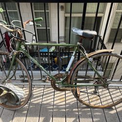 Vintage Rusted Schwinn varsity green Bike
