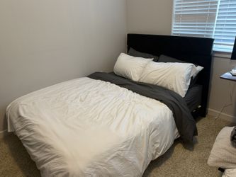 Black Full Sized Bed And Head Board.