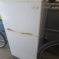Small Refrigerator Has Freezer And Fridge
