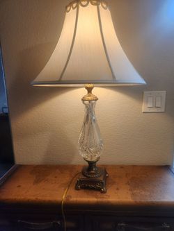 Glass and bronze table lamp